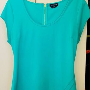 Teal color Bebe dress. Knee height.
